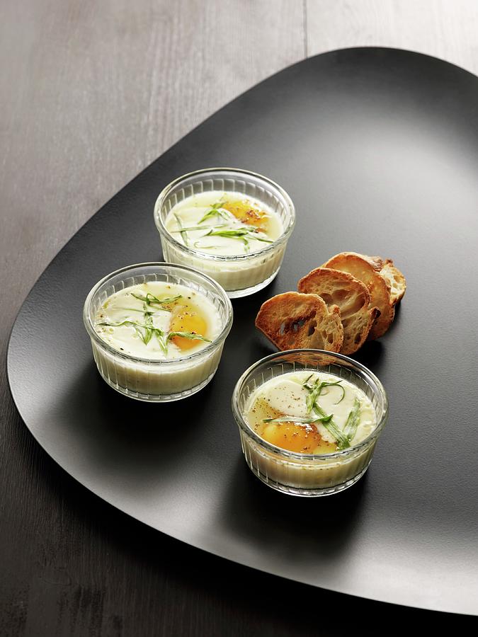 Oeufs En Cocotte baked Eggs, France With Chervil And Toasted Slices Of Bread Photograph by Atelier Mai 98