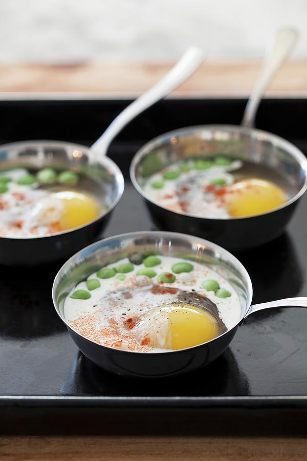 Oeufs En Cocotte With Mushrooms And Peas Photograph by Yelena Strokin