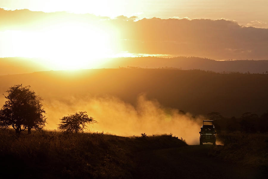 Off Road Vehicle At Sunset Photograph by Wldavies
