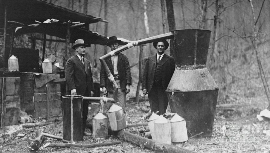 Officials Posing With Moonshine Still Photograph by Bettmann