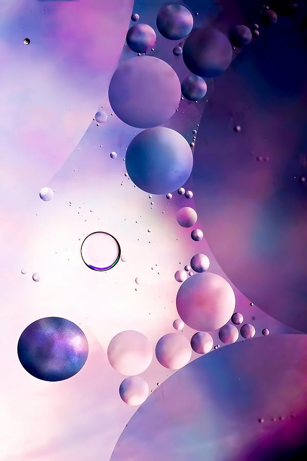 Oil And Water Purple Universe  Photograph by Harriet Feagin