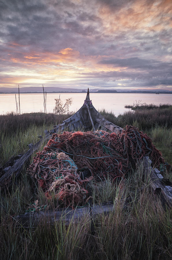 Old Abandoned Boat Covered In Fishing Nets Photograph by Cavan Images Old Abandoned Boat Covered In Fishing Nets Photograph by Cavan Images
