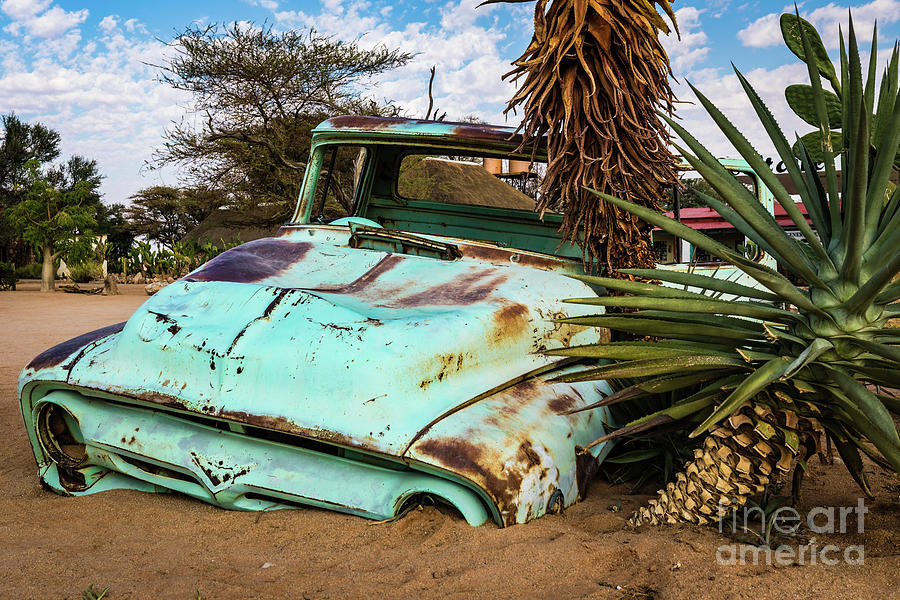 Old and abandoned car #2 in Solitaire, Namibia Photograph by Lyl Dil Creations