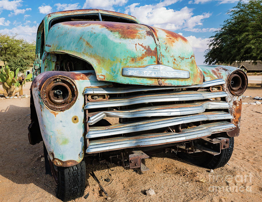 Old and abandoned car #4 in Solitaire, Namibia Photograph by Lyl Dil Creations