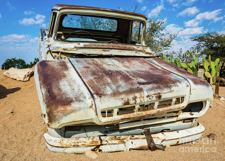 Old and abandoned car #5 in Solitaire, Namibia Photograph by Lyl Dil Creations