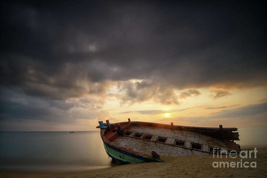 Old And Broken Wooden Boat On Sandy Photograph by Yusri Salleh