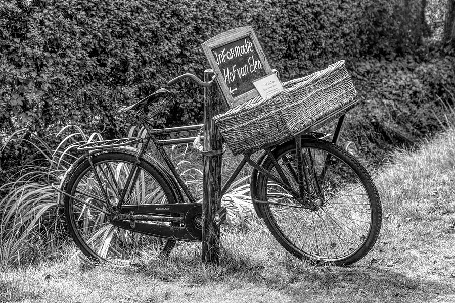Old Antique Bicycle in Black and White Photograph by Debra and Dave Vanderlaan