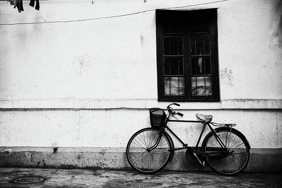 Old Bicycle Parked Against Wall Photograph by Librarymook