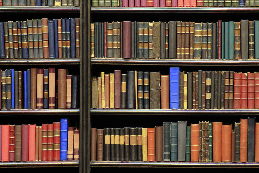 Old Books On A Library Photograph by Luoman