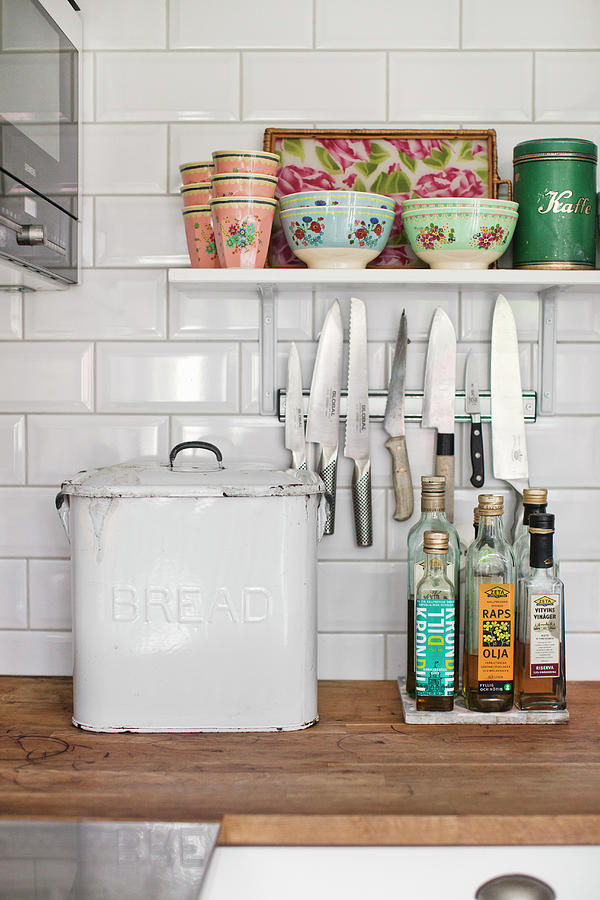 Old Bread Bin, Magnetic Knife Rack And Vintage Crockery On Shelf Photograph by Lina stling