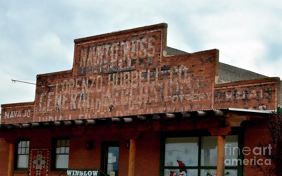 Brick Photograph - Old Brick Store Front Sign by Debby Pueschel