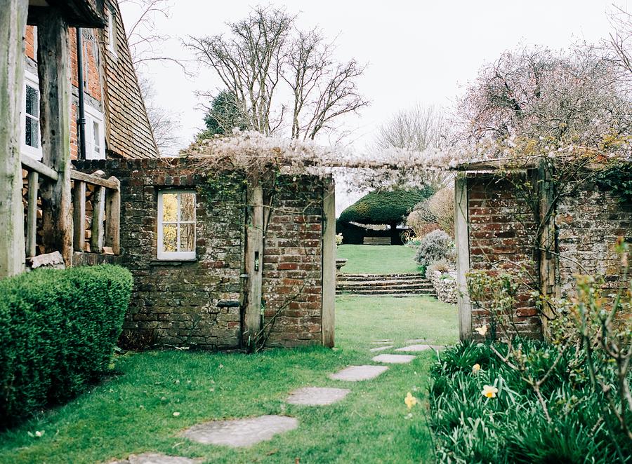 Old Brick Wall In A Beautiful English Garden In The Countryside ...