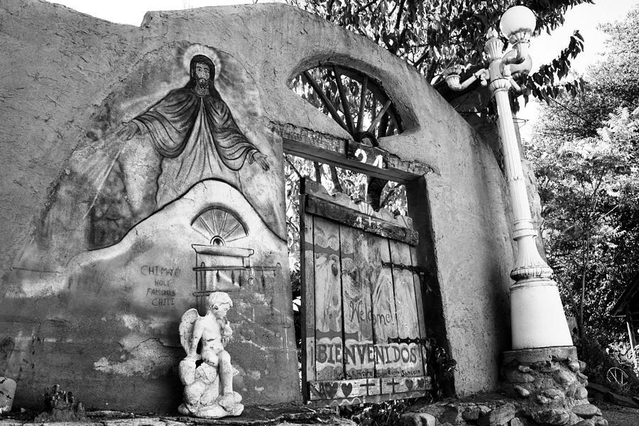 Old Chimayo adobe gate and Jesus Photograph by David Lee Thompson