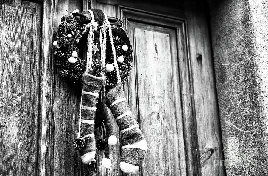 Christmas Photograph - Old Christmas Stockings in Salzburg by John Rizzuto