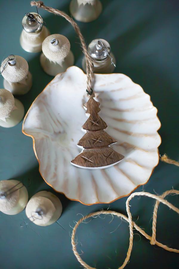 Old Christmas-tree Bauble In Scallop Shell Photograph by Alicja Koll