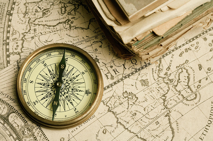 Old Compass Over Ancient Map Photograph by Cristian Baitg