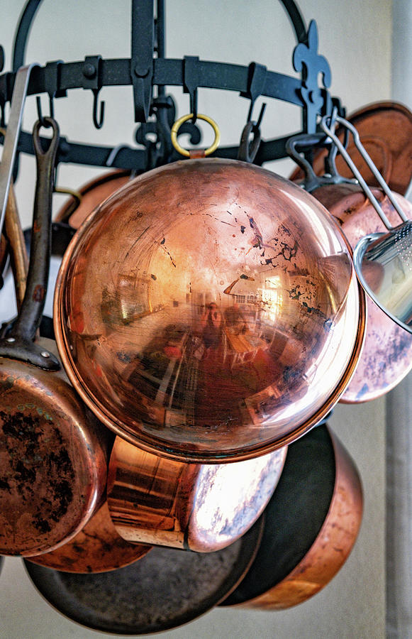 Old Copper Pans On A Metal Hanging Rack Photograph by Eising Studio