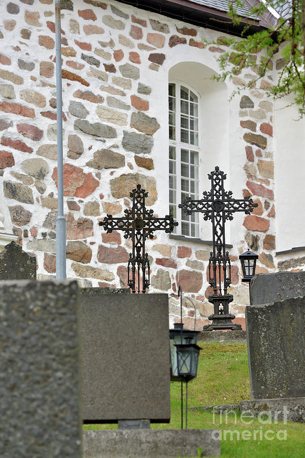 Old crosses at the grave Photograph by Esko Lindell
