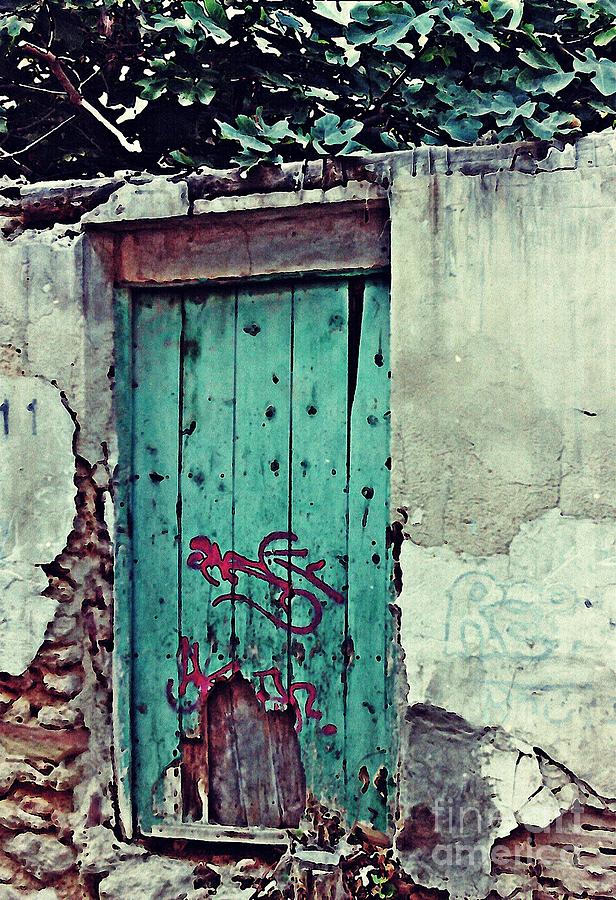 Old Door and Graffiti in Lorca Photograph by Sarah Loft