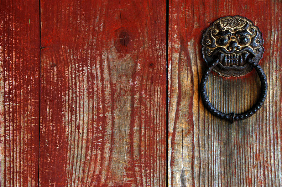 Old Door And Knocker At A Temple In Photograph by By Marc Guitard
