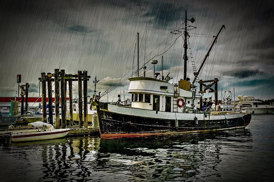 Old Fishing Trawler In Rain Photograph