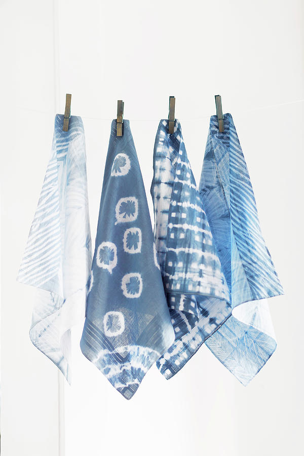 Old Handkerchiefs Hand-dyed Using Shibori Technique Hung From Line Photograph by Sabine Lscher