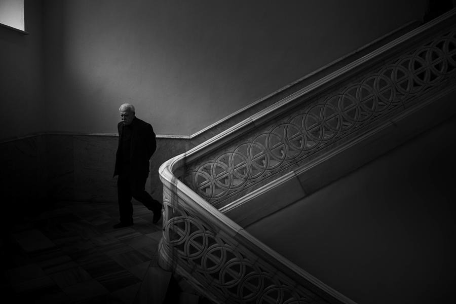 Old Man And Ladder Photograph by Ramiz Sahin