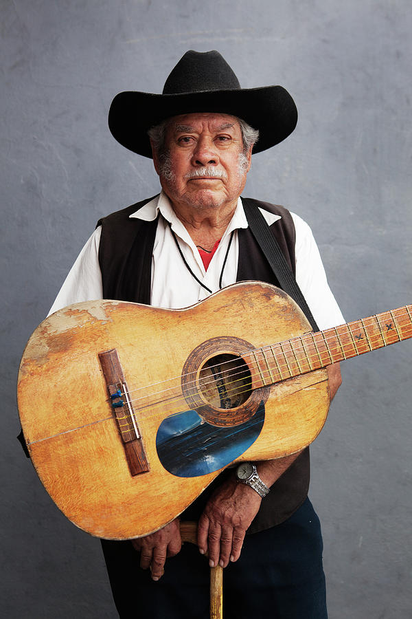 Old Man With His Hat, His Guitar And Photograph by Russell Monk