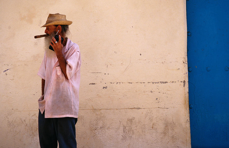 Old Man With Transistor Radio And Photograph by Dominic Bonuccelli Old Man With Transistor Radio And Photograph by Dominic Bonuccelli