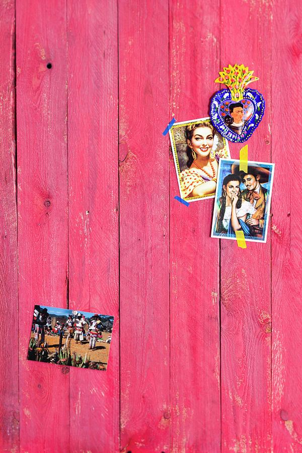 Old Mexican Photos On Wooden Wall Painted Red Photograph by Peter Kooijman