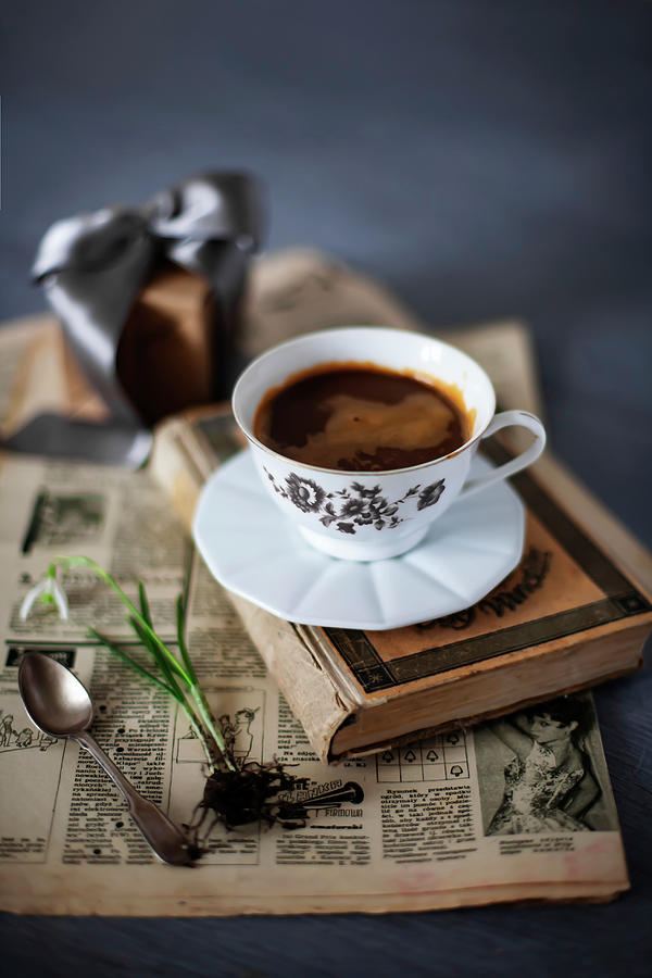 Old Newspaper, Book, Cup Of Coffee And Flower Photograph by Alicja Koll