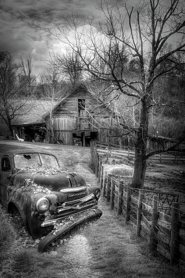 Old Rusty on the Farm in Black and White Photograph by Debra and Dave Vanderlaan