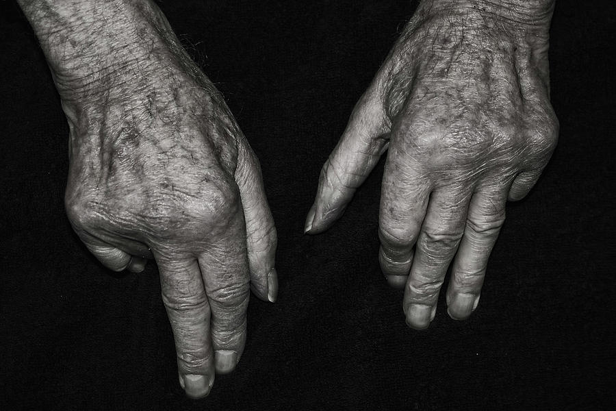 Old Watchmakers Hands showing a lifetime of accumalated wri Photograph by Doc Braham