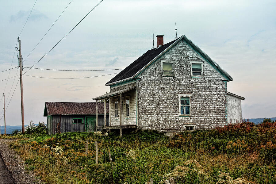 Old weathered house in Atlantic Canada Photograph by Tatiana Travelways