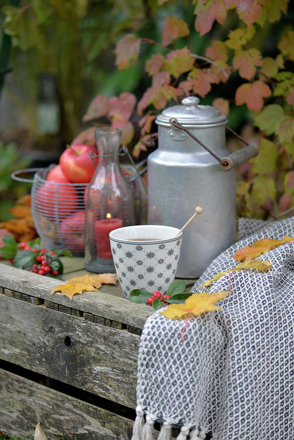 Old Wine Crate Decorated For Autumn With Apples, Milk Churn And Cup Of Tea Photograph by Daniela Behr