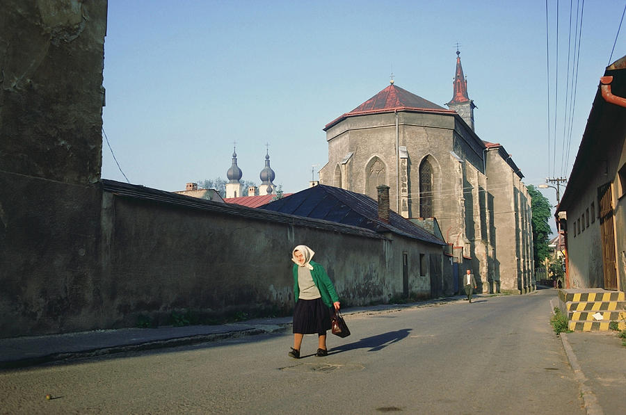 Old Woman Walking On A Down Street Photograph by Dreampictures | Fine ...