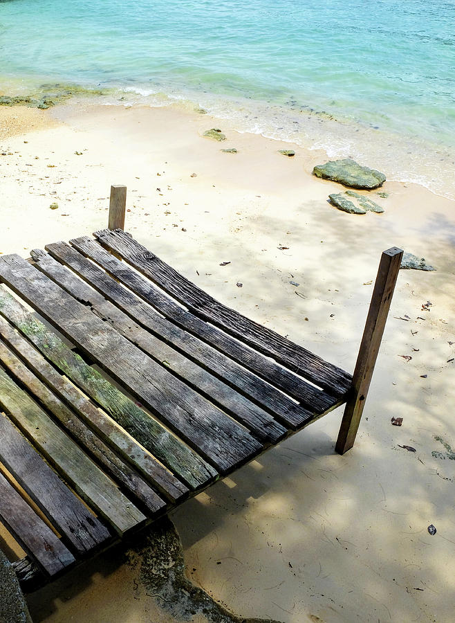 Wooden jetty on a blue sea Coffee Mug