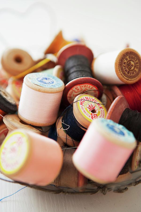 Old Wooden Reels Of Thread Photograph by Ulrika Ekblom