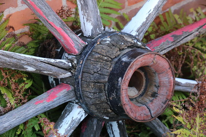 Old Wooden Wagon Wheel Photograph by Laura Smith
