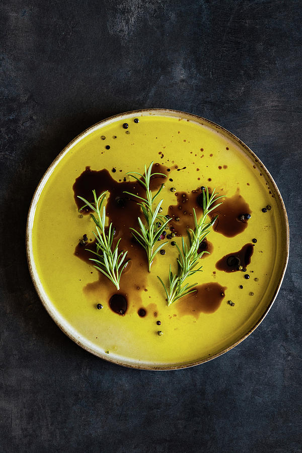 Olive Oil And Balsamic Vinegar Dip Or Dressing With Pink Salt And Rosemary Photograph by Alla Machutt