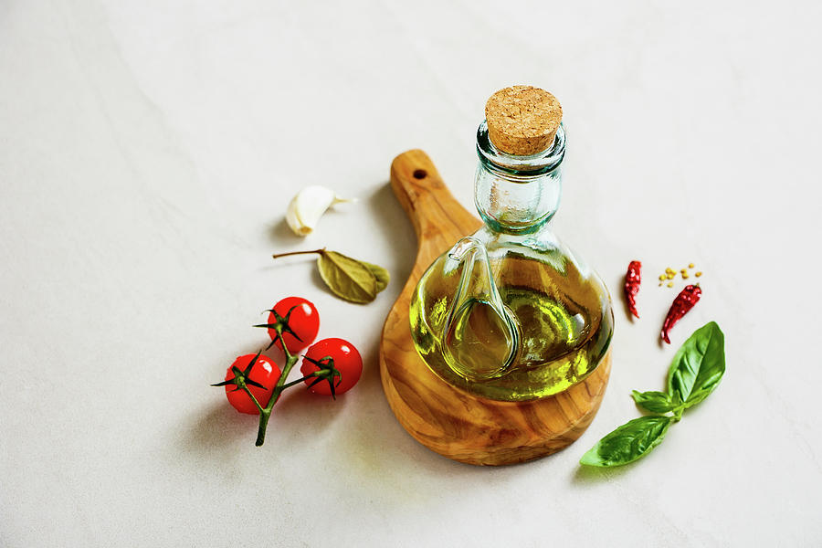 Olive Oil And Healthy Seasonal Ingredients Photograph by Yuliya Gontar
