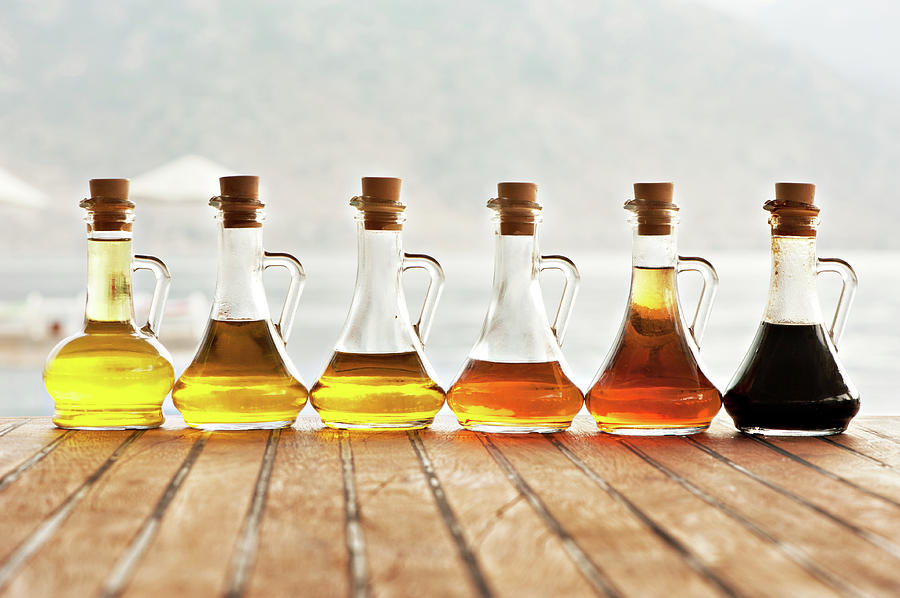 Olive Oil And Vinegar In Bottles Photograph by Ralucahphotography.ro