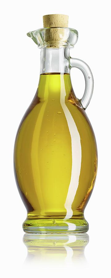 Olive Oil In Carafe Photograph by Michael Lffler