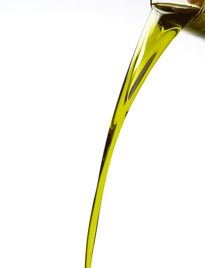 Olive Oil Pouring, White Background Photograph by Domino