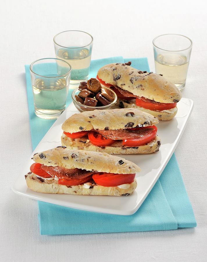 Olive Rolls With Tomatoes And Anchovies Photograph by Franco Pizzochero