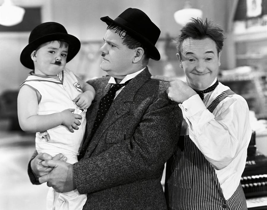OLIVER HARDY , STAN LAUREL and SPANKY in TIT FOR TAT -1935-. Photograph by Album