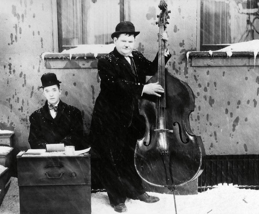 OLIVER HARDY and STAN LAUREL in BELOW ZERO -1930-. Photograph by Album