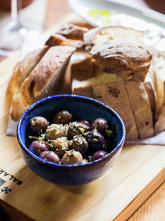 Olives And Bread appetizer, Portugal Photograph by Magdalena Paluchowska