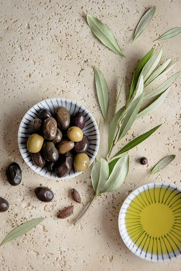 Olives With An Olive Branch And Olive Oil, View From Above Photograph by Magdalena Hendey