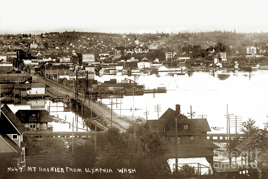 Olympia from around 1904, looking across the Fourth Avenue Bridge over the mouth of the Deschutes Ri by California Views Archives Mr Pat Hathaway Archives Olympia from around 1904, looking across the Fourth Avenue Bridge over the mouth of the Deschutes Ri by California Views Archives Mr Pat Hathaway Archives